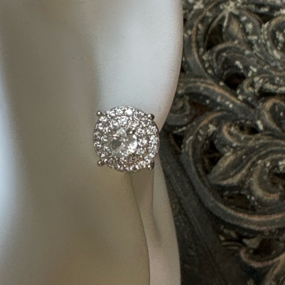 Silver plated Zircon earring. I placed on a dime for size reference